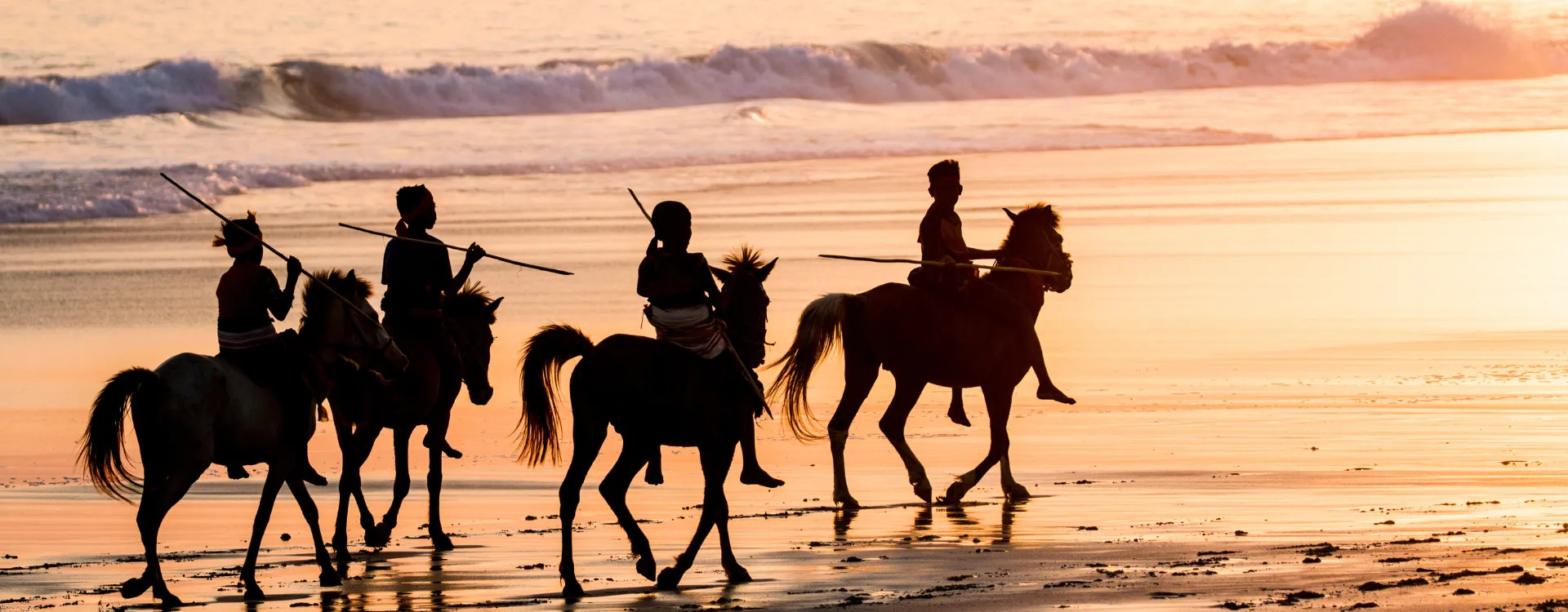 Horse riding in Sumba at sunset