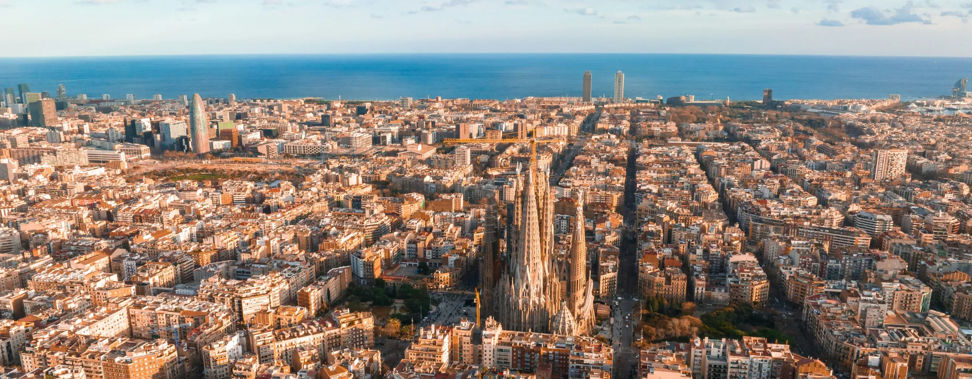 Aerial view of Barcelona, Spain, featuring the Basílica de la Sagrada Família