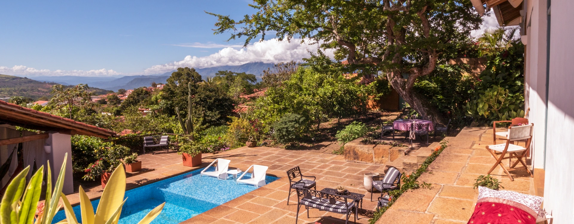 Swimming pool and terrace with mountain views