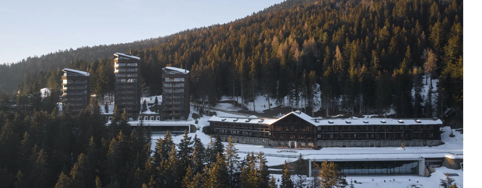 Aerial image of FORESTIS Dolomites luxury hotel in the mountains