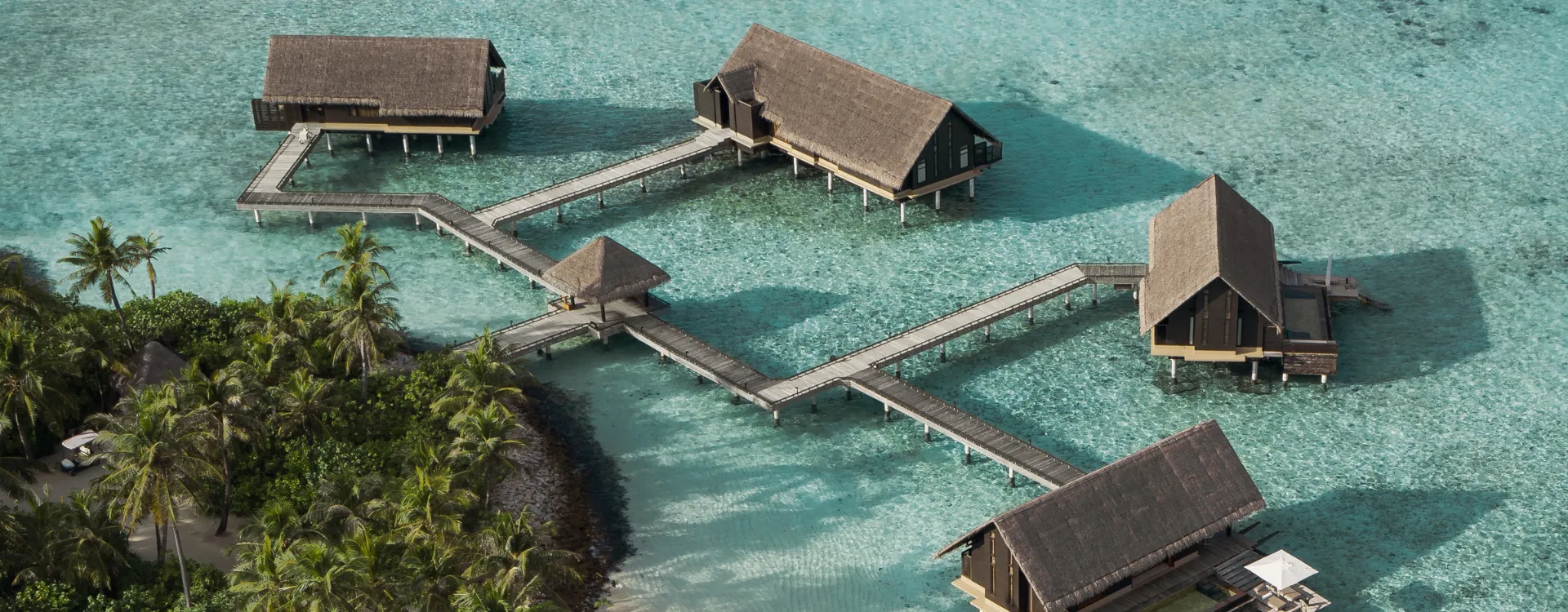 Aerial image of water villas at One and Only Reethi Rah